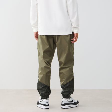 NIKE PANT JOGGER WINDRUNNER GROEN/WIT HEREN