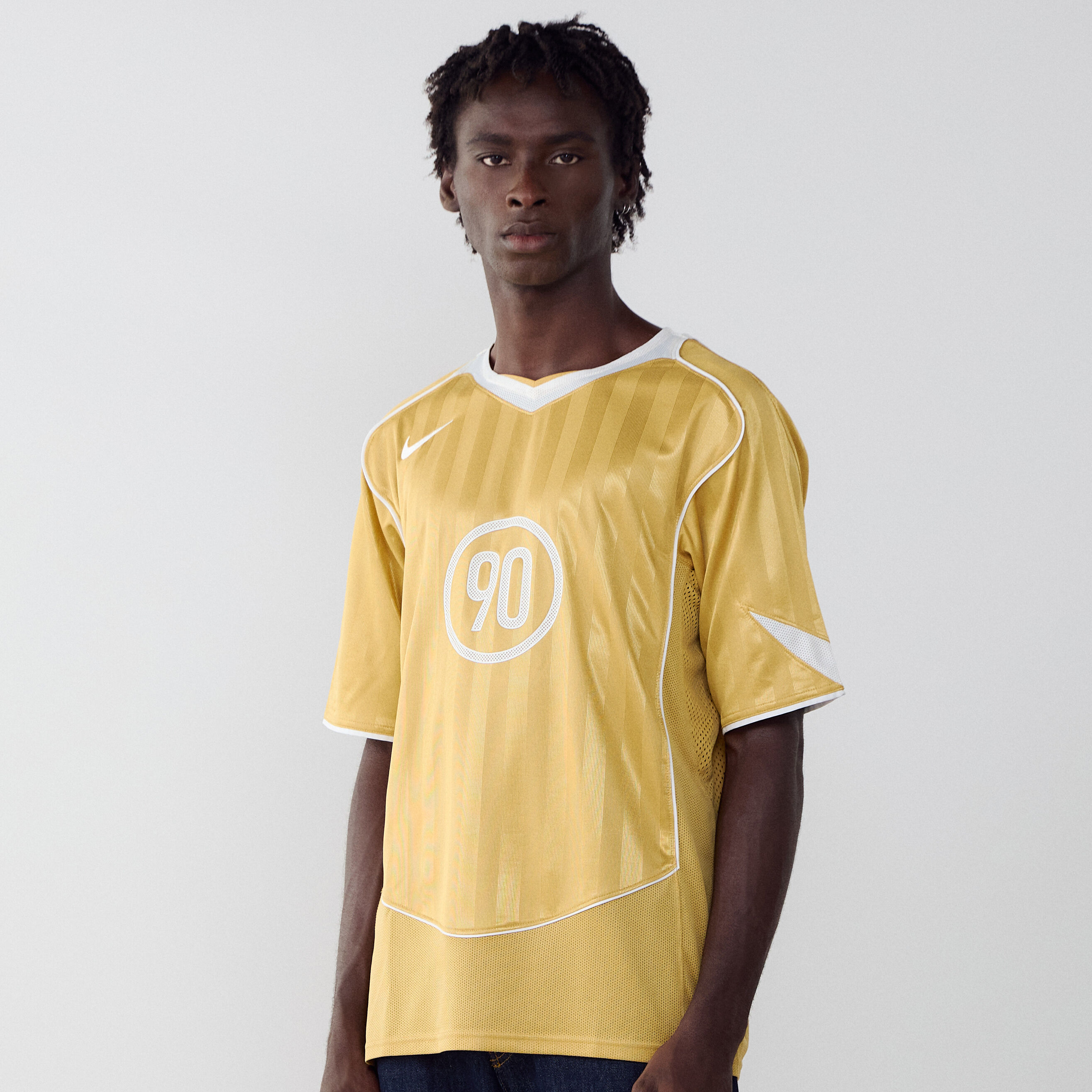 yellow nike tee