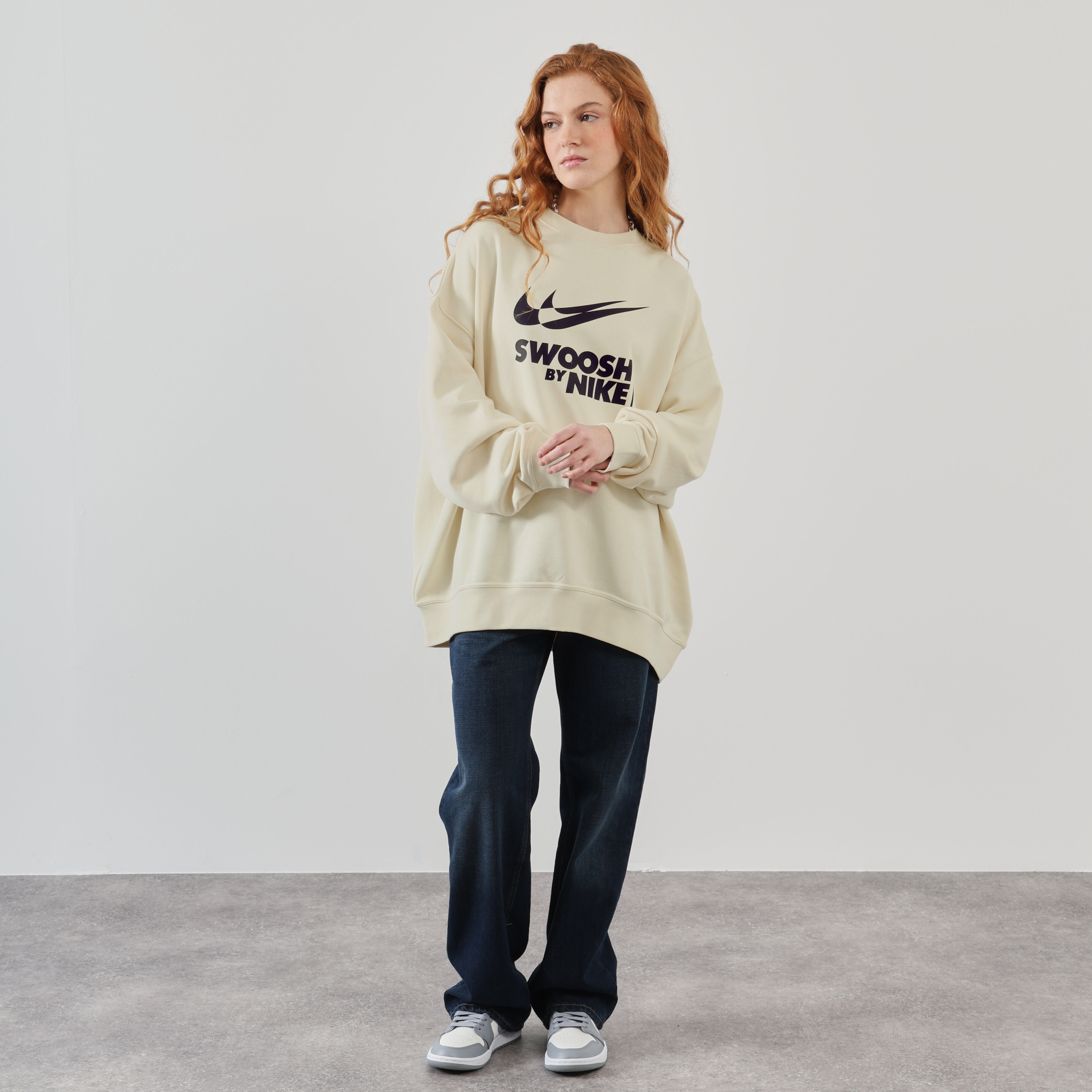 Nike trui dames beige 2025