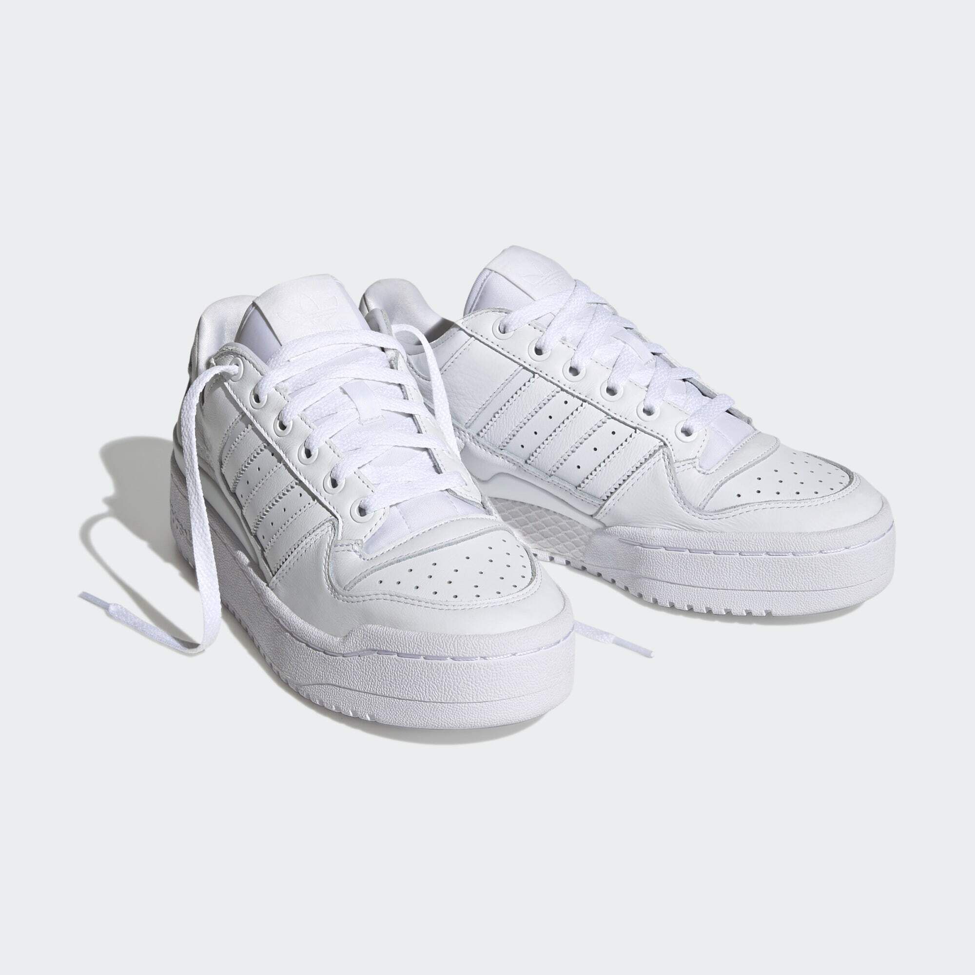 Adidas originals rivalry low store sneakers in triple white