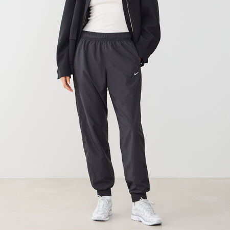 NIKE PANT JOGGER ESS WVN ZWART/WIT DAMES