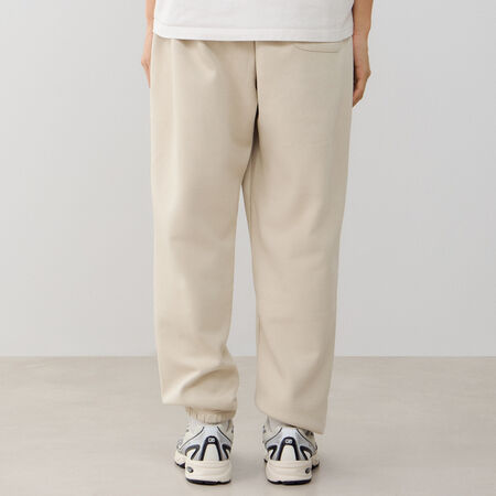 NEW BALANCE PANT JOGGER BOSTON LOGO BEIGE/BRUIN HEREN