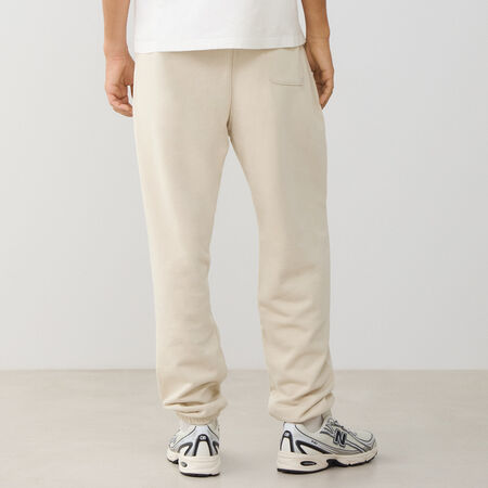 NEW BALANCE PANT JOGGER SMALL LOGO FT BEIGE/WIT HEREN