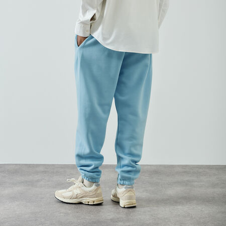 NEW BALANCE PANT JOGGER SMALL LOGO BLEU CIEL HEREN