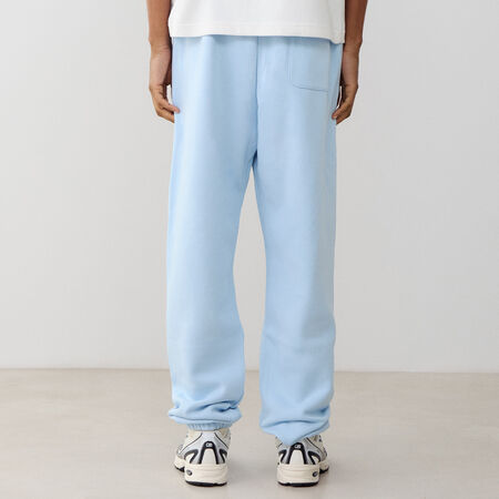 NEW BALANCE PANT JOGGER SMALL LOGO BLEU CIEL HEREN